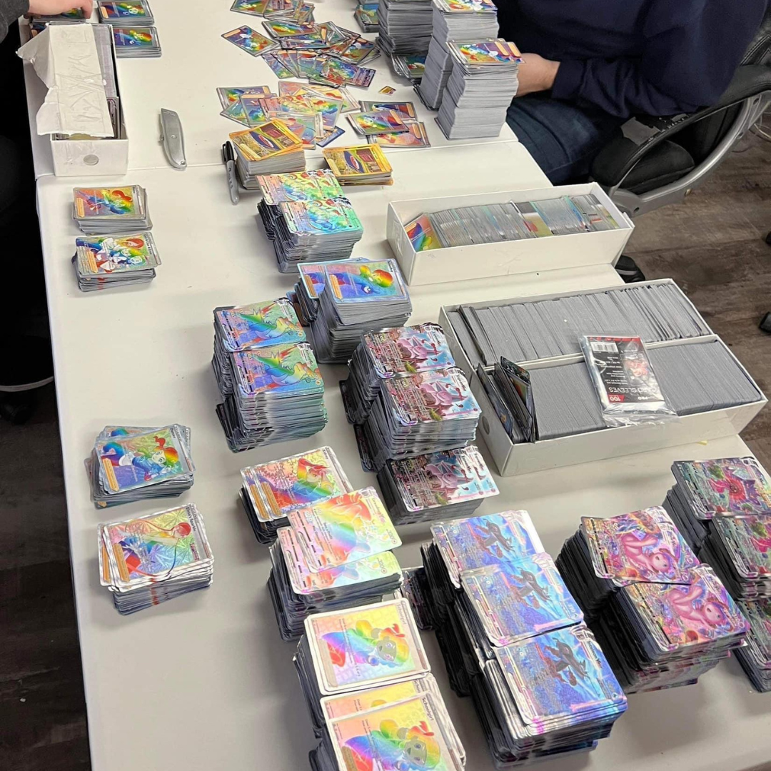 stacks of allegedly stolen pokemon cards