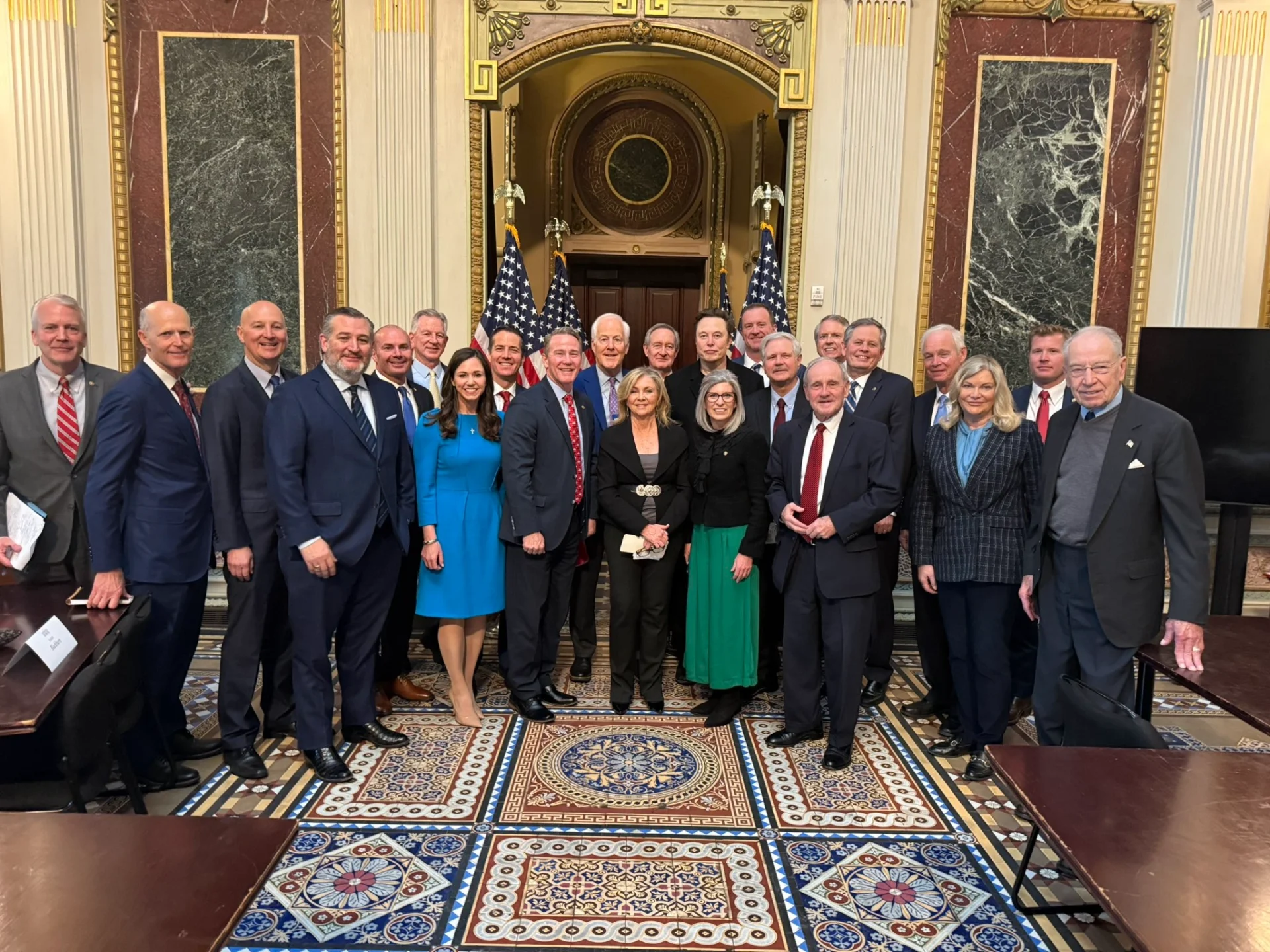 Senate DOGE Caucus pose for a photo with Elon Musk
