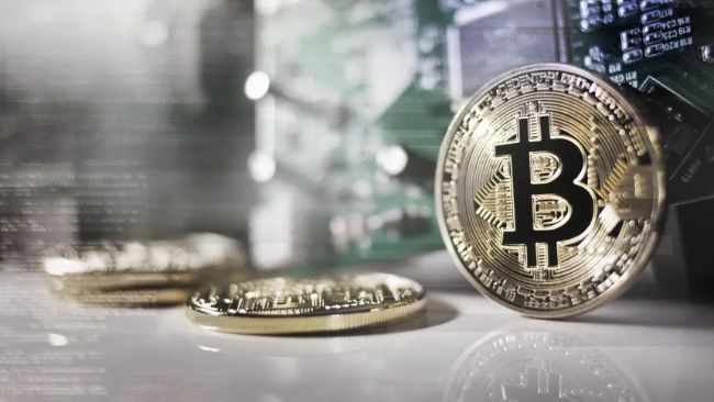 Bitcoin Consolidates Near Key Support Band — $77,000 Holds The Key To The Next Move