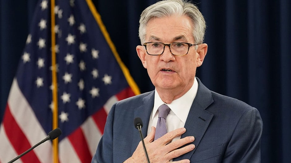 Fed promises to raise rates